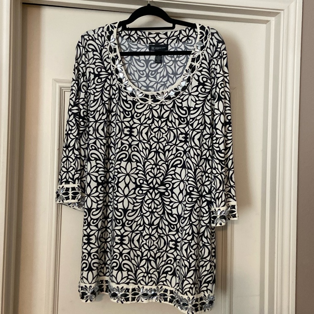 Over the head, bejeweled, 3/4 sleeve black and white top.